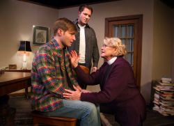 Chris Hester (as Tom) shares a difficult moment with his mother (Linda Beringer), putting her assistant Brandt (Chris O'Neill) in an awkward situation